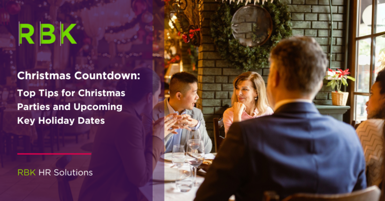 A group of people chat at a festive restaurant table decorated for Christmas. On the left, a purple banner reads: Christmas Countdown: Top Tips for Christmas Parties and Upcoming Key Holiday Dates. RBK HR Solutions logo is displayed.
