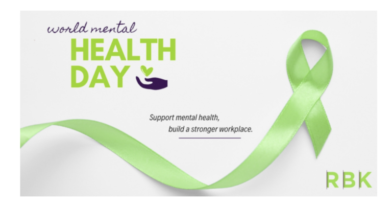 Green ribbon with text: “World Mental Health Day” and “Support mental health, build a stronger workplace.” A green ribbon curves across the image. The letters RBK appear in the bottom right corner.